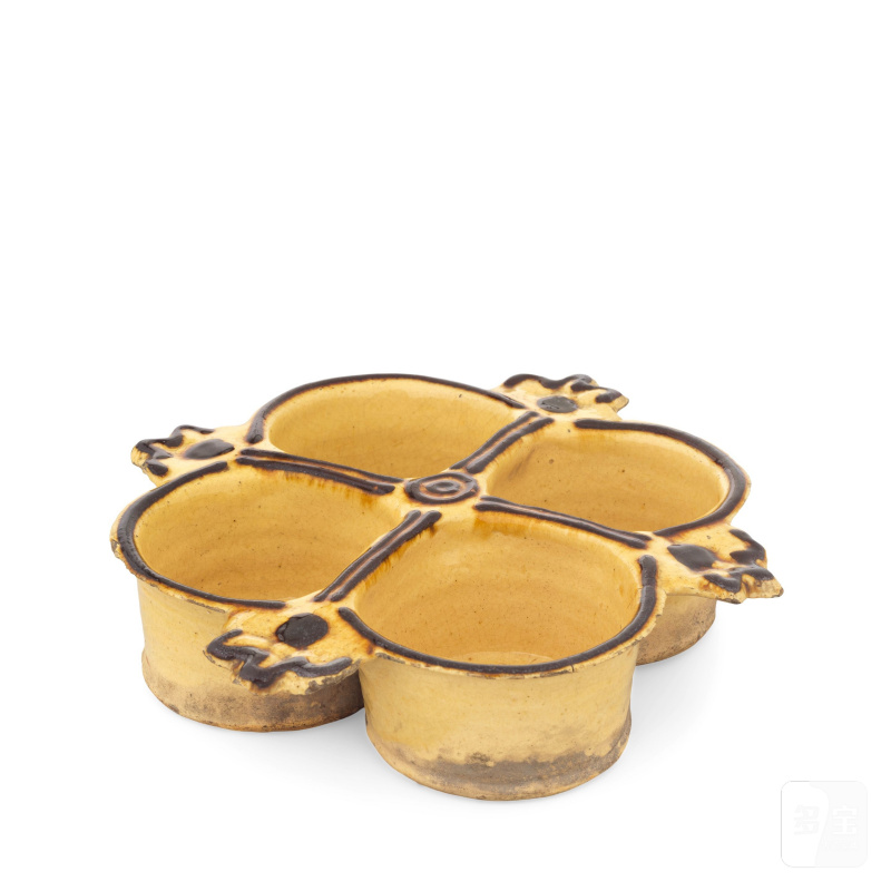 An English slipware sweetmeat or condiment dish, probably Staffordshire, late 17th or early 18th century